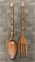 Large wooden decorative fork and spoon