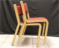 Pair of Stackable Wood and Red Seated Chairs