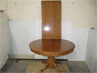 48" Round Oak Pedestal Table with Leaf