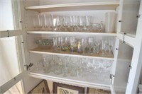 Contents of 3 shelves of stemware, sugar and