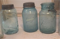 Blue glass Ball jars, wire top jars, and malt