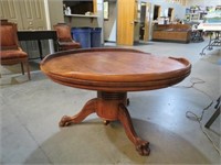 CLAW FOOTED ROUND OAK COFFEE TABLE