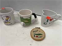 Golf theme mugs & x-stitch decor.
