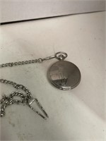 Pocket watch w/ chain. Golf.