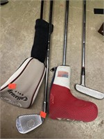 Lot of 4 golf clubs.