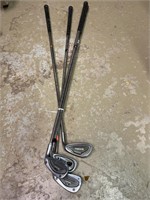 Lot of 4 Golf Clubs.