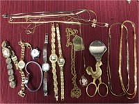 15 assorted costume jewelry pieces. Watches,