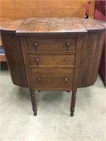 Vintage sewing cabinet with contents.  29” tall x