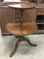 2  Tier table.  30” tall x 20” round.  Has some