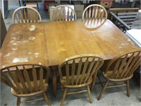 72? long table with 6 chairs.  Sturdy but has