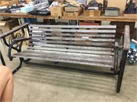 Metal and wooden gliding bench.  68” long