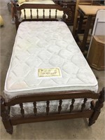 Twin bed with mattress and box spring