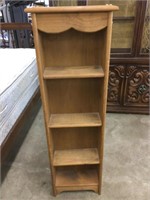 4 foot tall standing shelf.  15” wide x 6” deep