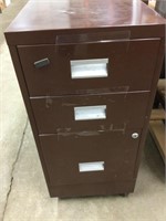 Rolling metal 3 drawer file cabinet .  31” tall