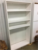 White open cabinet with open adjustable shelves
