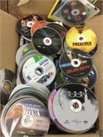 Box of DVD movies and tv series, most without