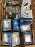 Unopened AirBuds, audio cable, phone adapter and