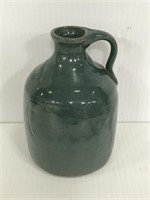 Small green pottery jug