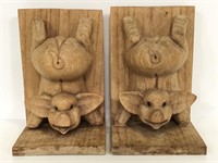 Pair of carved wooden pig bookends