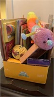 Box of children’s toys and books
