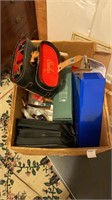 Box lot containing Stellarscope, CDs, binoculars,