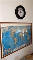 Framed world map and wall clock