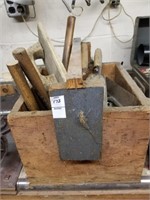 Wood tool box with towels and hammers