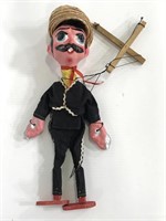 Handmade chalk ware man string puppet