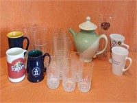 Beautiful 8" pottery pitcher and assorted mugs