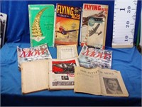 Assortment of vintage magazines and advertisement
