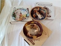 Three vintage collector plates. Two are Norman