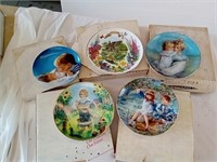 Five vintage collector plates.