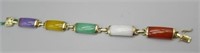 14K Jade Bracelet. Measures 7 3/8" Long.