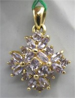 14K Starburst Pendant with 1.00 CTTW Tanzanite.