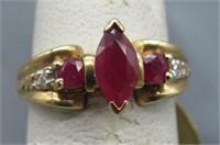 14K Gold Ring with Rubies and Diamonds. Size 4.5.