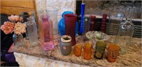 large selection of vases and votives
