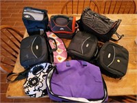 large selection of duffles, lunch bags, golf bag