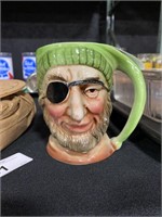 Hand painted Japanese pirate Toby-style mug.