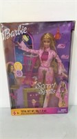 2003 secret spells Barbie.  New in box.  No.