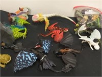 Large group of kids toys including dragons, Etc