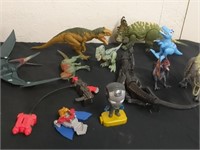 Large group of toy dinosaurs