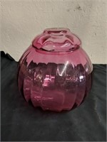 9 in pink glass jar. No markings