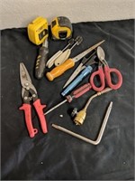 Group of miscellaneous tools such as snippers,