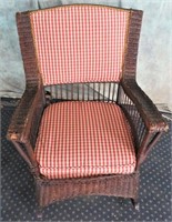 VINTAGE CUSHIONED WICKER ROCKING CHAIR