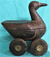 WOOD &  BRASS CARVED DUCK ON WHEELS