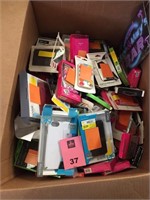Box of iPhone and Samsung Phone Cases