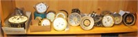 LARGE SHELF LOT OF CLOCK FACES