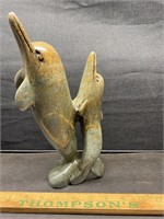 Carved dolphins