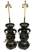 Pair of Ornate Bronze Asian Lamps.
