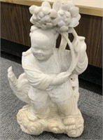 Marble Carving of an Asian Child.